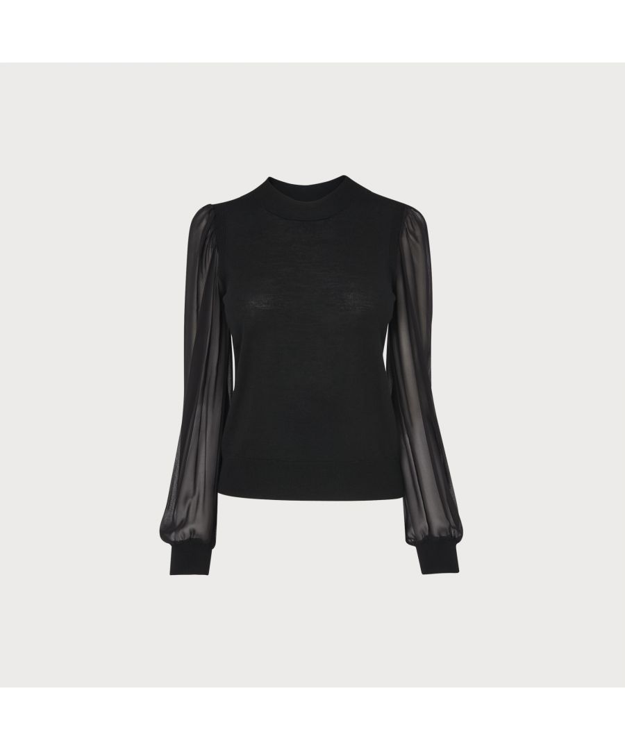 A knit with party spirit, our Rosa jumper is perfect for dressing up simple separates. Crafted from extra-fine merino wool in black, it's a round neck style with long, sheer silk organza sleeves and a classic fit. Offering some glamour, wear it with tailored trousers, jeans or a pencil skirt for dressier moments during the winter season.