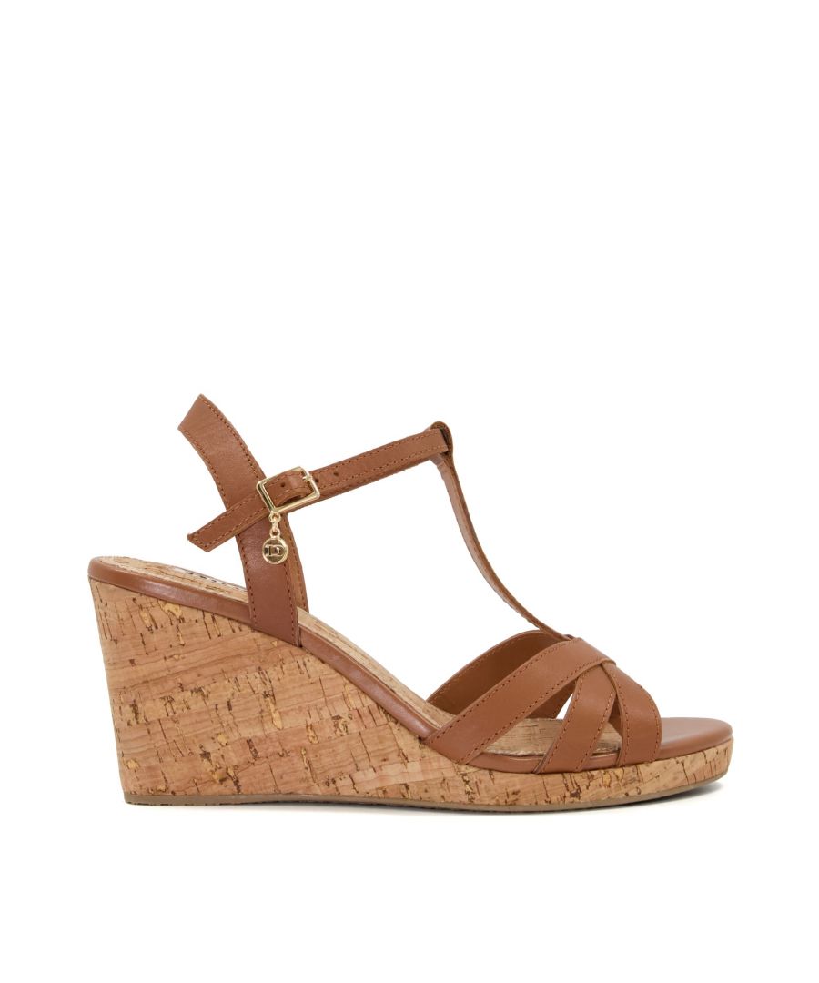 Whether you're in the city or seaside, invest in timeless sandals like Keep. Crafted in-house with smooth leather, multiple straps interlink at the open-toe front. They rest on a mid-length corkscrew wedge, whilst the secure side-buckle fastening is