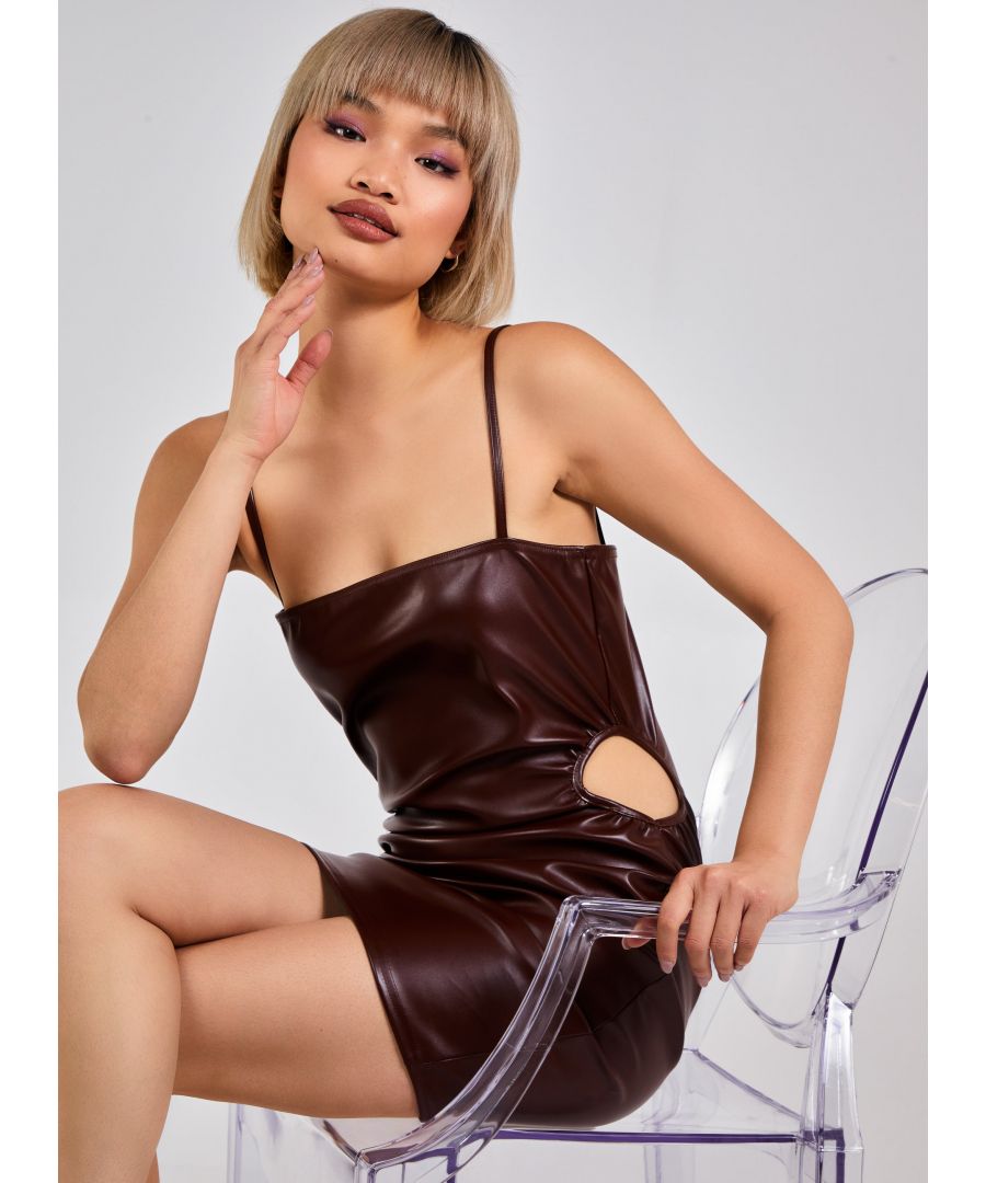 Add an edgy feel to your wardrobe with this cut out PU mini! Composition: 95% Polyester, 5% Elastane. Wash Similar Colours. Iron On Reverse. Do Not Dry Clean.
