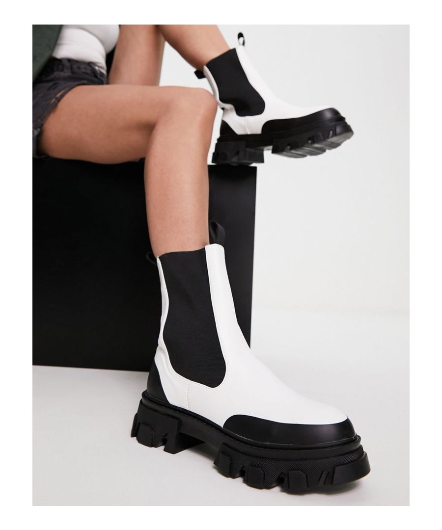 Boots by Public Desire The chunkier, the better Pull tabs for easy entry Elasticated inserts Round toe Chunky sole Lugged tread  Sold By: Asos