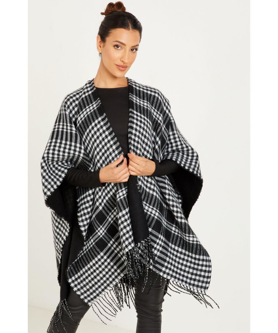 - Dog tooth print  - Check design   - Cape style  - Tassel edge  - Synthetic