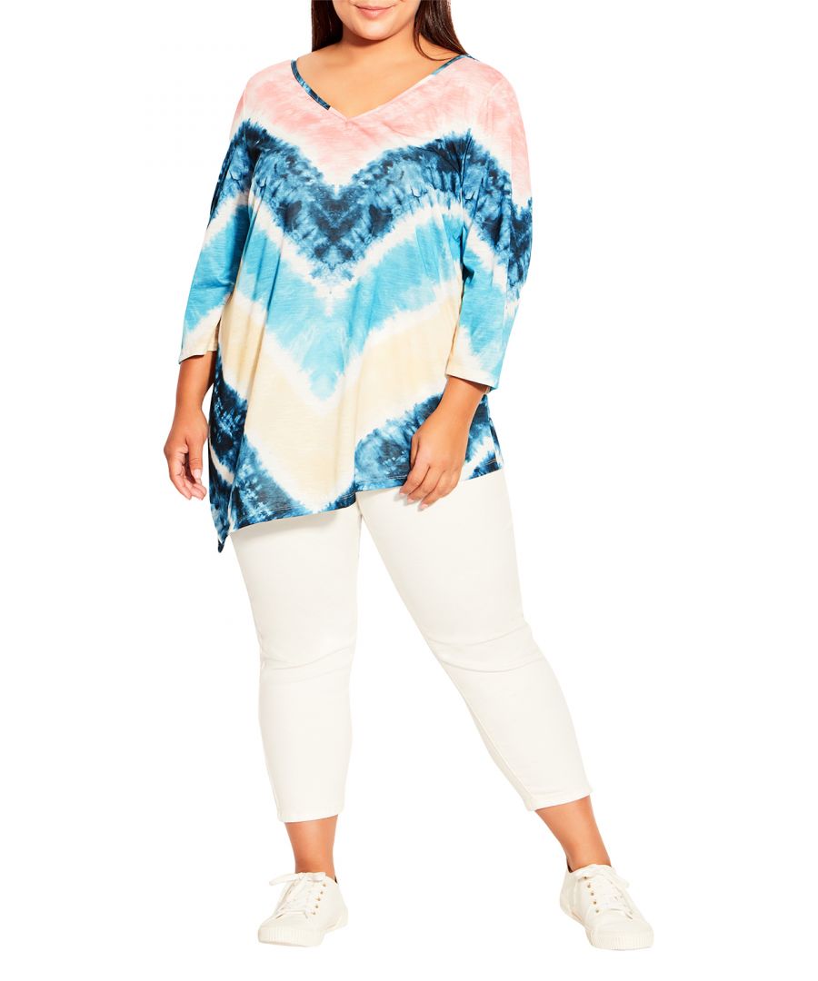 Elevate your off-duty look wearing the 3/4 Sleeve Tie Dye Top. Timeless and playful, this style features 3/4 length sleeves and an asymmetrical point hemline. Key Features Include: - Round neckline - 3/4 length sleeves - Pull-over fit - Relaxed silhouette - Easy wear, easy care fabrication - Asymmetrical point hemline
