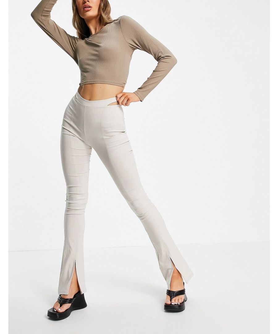 High rise\nCut-out waistband \nZip-back fastening \nSkinny fit \nFlared at the knee, regular on the waist \nSoft, stretchy ponte jersey\nLike T-shirt fabric, but thicker\nMain: 72% Viscose, 25% Polyamide, 3% Elastane