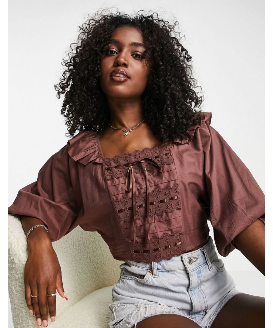 Blouse by ASOS DESIGN Your better half Square neck Frill shoulders Volume sleeves Broderie and ribbon trim V-back Cropped length Regular fit Sold by Asos