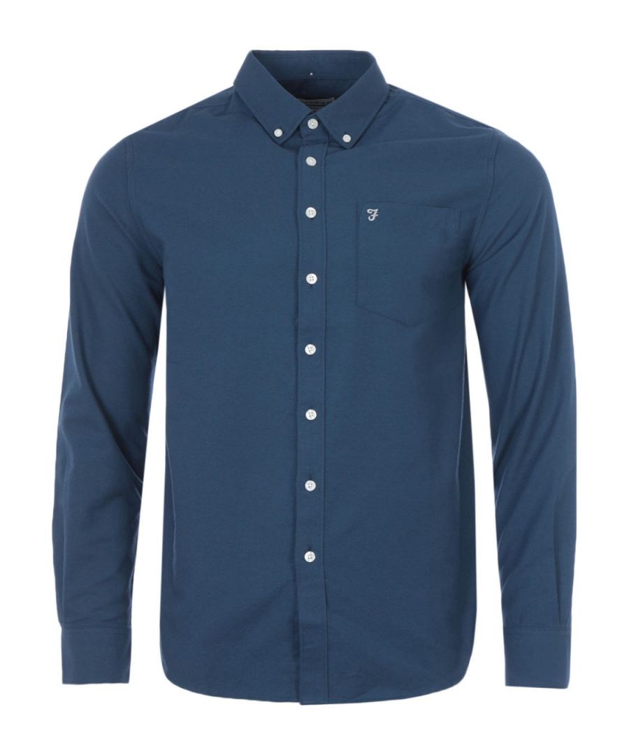 Crafted from a blend of cotton and polyester, the Drayton Oxford Shirt from Farah is fitted with a classic button down collar, full button placket, patch chest pocket and long sleeves with buttoned cuffs. Finished with the iconic Farah logo embroidered at the chest. The perfect shirt to upgrade your wardrobe. Modern Fit, Oxford Cotton Polyester Blend, Button Down Collar, Full Button Placket, Chest Patch Pocket, Long Sleeves with Buttoned Cuffs, Farah Branding. Style & Fit: Modern Fit, Fits True to Size. Composition & Care: 65% Cotton, 35% Polyester, Machine Wash.