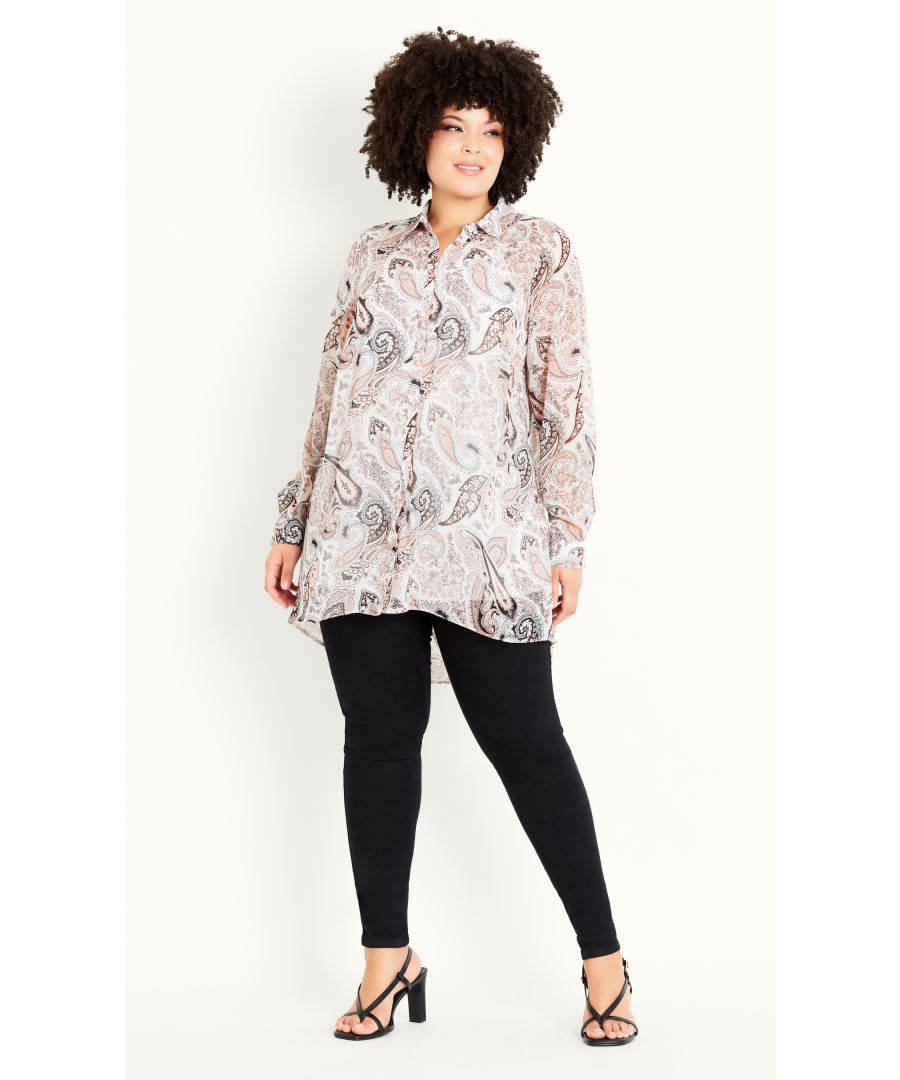 When there's a statement to be made, the pink Paisley Shirt is just the trick! Catching the eye with bespoke paisley print, master smart-casual style in a relaxed button front fit, a classic shirt collar neckline and a lining cami. Key Features Include: - Shirt collar neckline - Full length button cuff sleeves - Button down front closure - Paisley floral print - Non-stretch fabrication - Hi-lo hip length hemline - Lining cami included Layer over skinny denim jeans with pumps heels for work, play and everything in between.