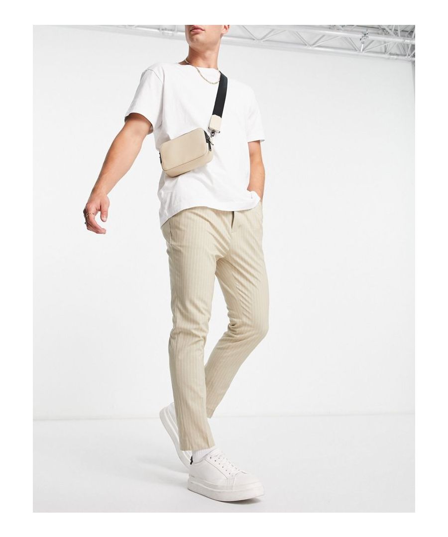 Trousers by ASOS DESIGN Do the smart thing All-over stripe print Regular rise Belt loops Functional pockets Regular, tapered fit Sold by Asos