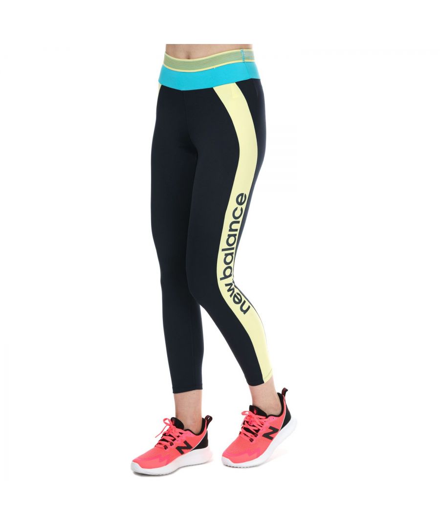 Womens New Balance Achiever Remix High Rise 7-8 Tights in navy yellow.- Streamlined rib elastic waistband.- High rise.- NB DRYx premium  fast-drying technology wicks moisture away from your body to help you dominate your workout.- Stretch and a soft feel.- 25 inch inseam.- Features seasonal colors.- Contrast branding.- Fitted silhouette designed to feel snug at the hip and thigh and allow.- Body: 77% Recycled Polyester  23% Spandex. Lining: 91% Polyester  9% Spandex. Machine washable. - Ref: WP11156LHZ
