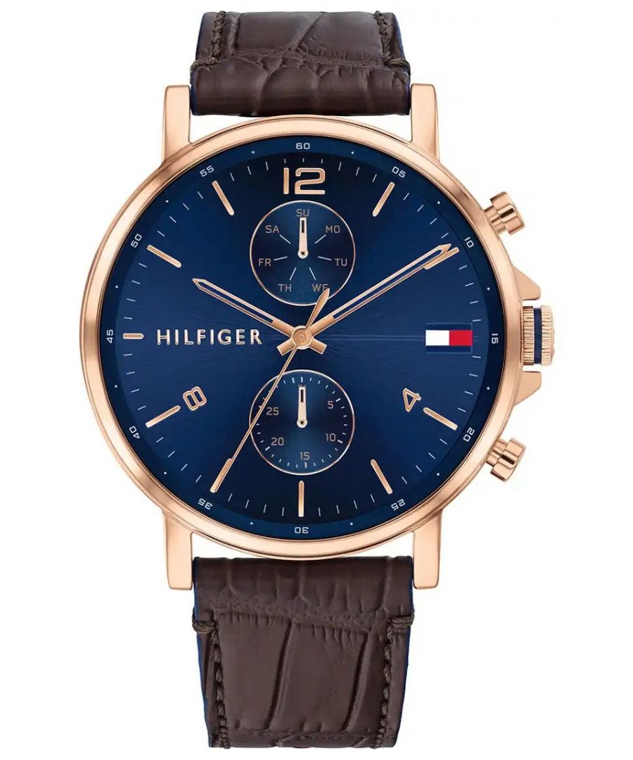 This Tommy Hilfiger Daniel Multi Dial Watch for Men is the perfect timepiece to wear or to gift. It's Rose gold 44 mm Round case combined with the comfortable Brown Leather watch band will ensure you enjoy this stunning timepiece without any compromise. Operated by a high quality Quartz movement and water resistant to 5 bars, your watch will keep ticking. Get all the comfort with this fashionable croco-embossed leather band, perfect for every occasion  -The watch has a calendar function: Day-Date High quality 21 cm length, 21 mm wide, Brown Leather strap with a Buckle Case diameter: 44 mm, Case height: 10 mm and Case color: Rose Gold Dial color: Blue