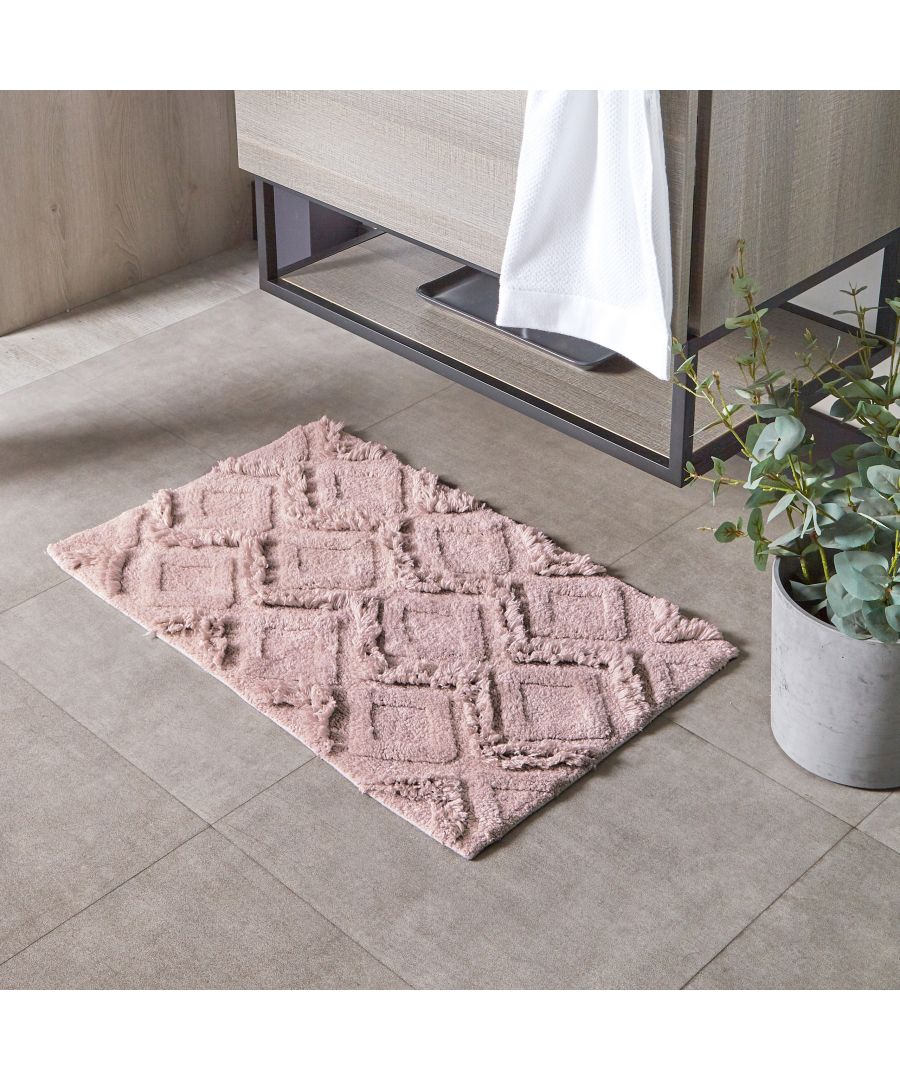 Celebrating an iconic global design, the Diamond cotton tufted bath mat has a wonderfully soft underfoot, and is also quick-drying with an anti-slip quality, keeping it in place on your bathroom floor.