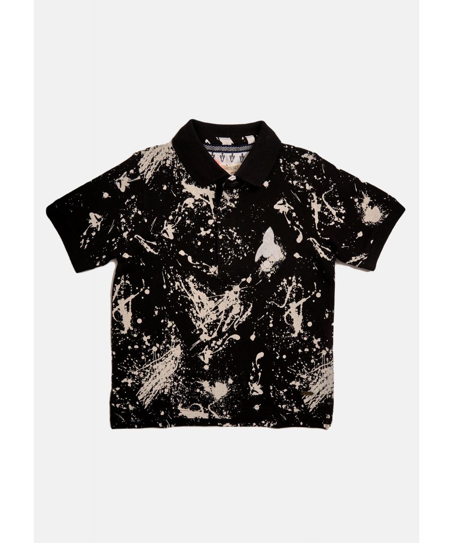 Stand out in the style department with this paint splat print polo. Black pique with white print flat rib collar and branded button placket. For a sharp  daytime look  team with skinny jeans and trainers.  Angel & Rocket cares - made with fairtrade cotton   Black   About me: 100% cotton   Look after me: think planet  Machine wash at 30c