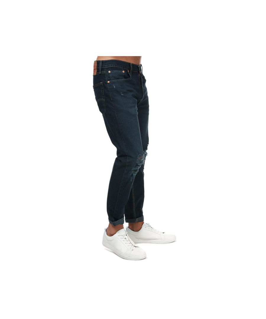 Men's Levi's 502 Taper Hi- Ball Jeans in dark blue.- 5-pocket construction. - Zip fly and button fastening.- Branded leather patch at rear waist.- Logo tag to reverse.- Belt loops.- Rolled hem.- Cut closely around the thigh with a narrow shape through the leg.- Tapered fit.- 98% Cotton  1% Elastane.- Ref: 577830096