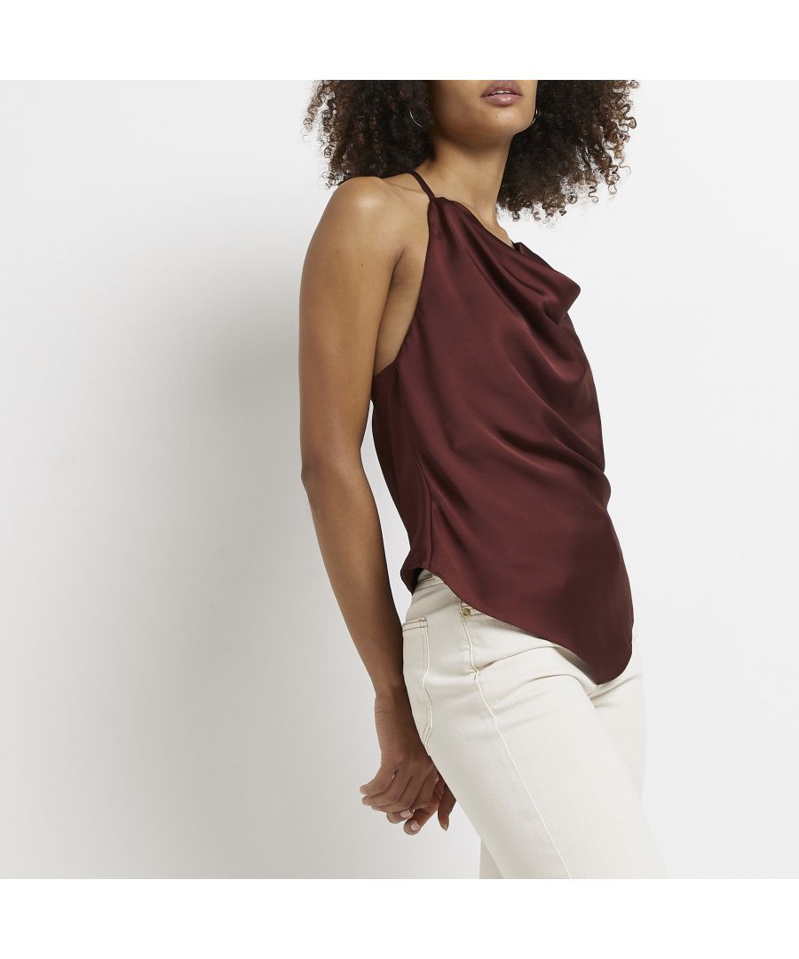 > Brand: River Island> Department: Women> Colour: Brown> Type: Blouse> Size Type: Regular> Material Composition: 100% Polyester> Occasion: Casual> Pattern: No Pattern> Material: Polyester> Neckline: Halter Neck> Sleeve Length: Sleeveless> Season: SS22