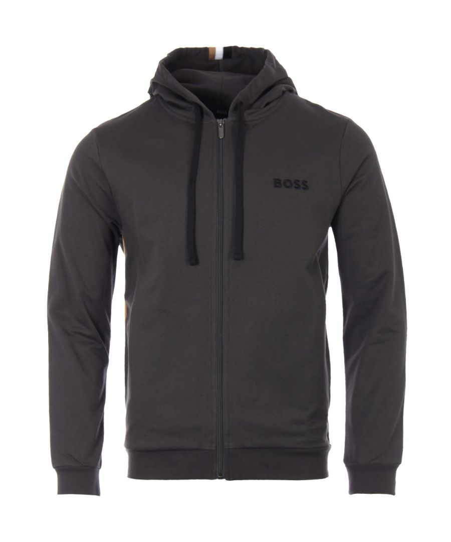 Elevate your loungewear with the Heritage Signature Stripe Zip Hooded Sweatshirt from BOSS Bodywear. Crafted from pure cotton terry providing day long comfort and breathability. Featuring an adjustable drawstring hood, a full zip closure, side seam pockets, elasticated cuffs and signature stripe inserts for a distinctive look. Finished with the signature BOSS logo embroidered at the chest. Regular Fit, Pure Cotton Terry, Adjustable Drawstring Hood, Full Zip Closure, Side Seam Pockets, Elasticated Cuffs, Signature Stripe Inserts, BOSS Branding. Fit & Style:Regular Fit, Fits True to Size. Composition & Care:100% Cotton, Machine Wash.
