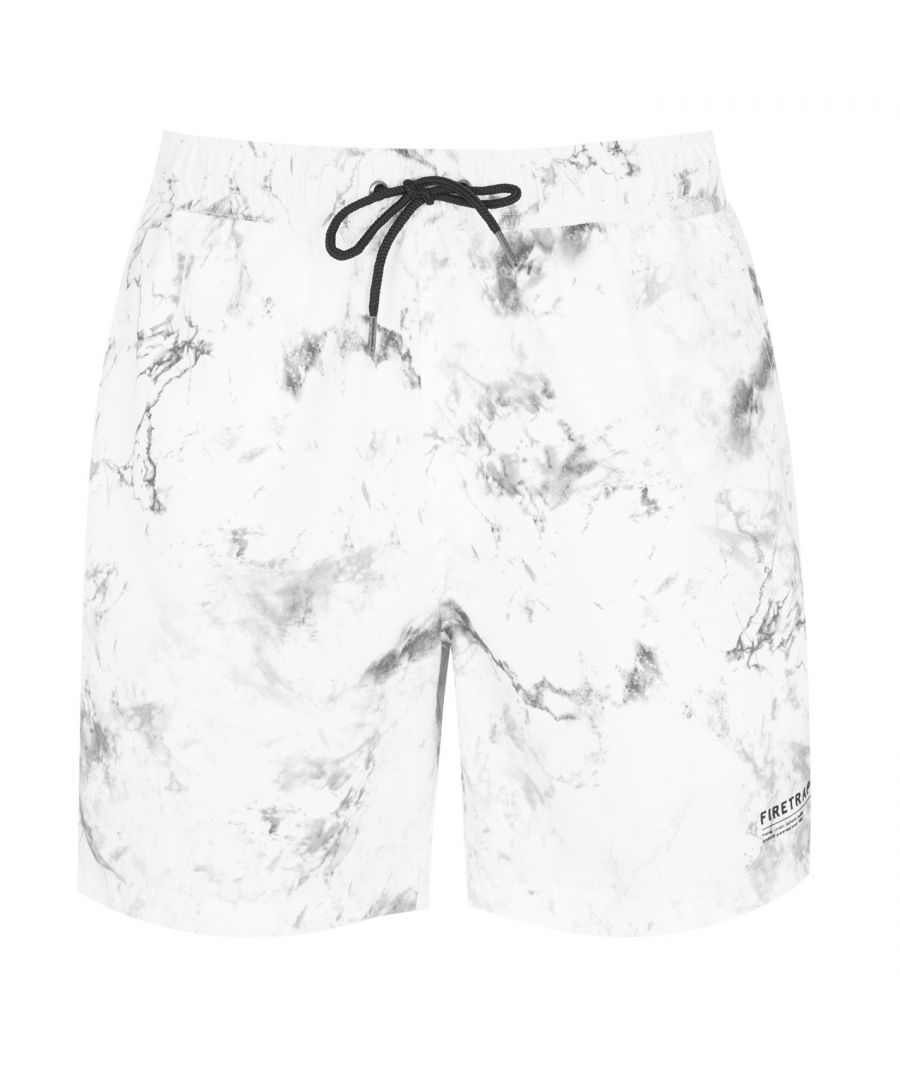 Firetrap AOP Swim Shorts Mens - These Firetrap AOP Swim Shorts are crafted with an elasticated waistband and drawstring adjustment for a secure fit. They feature three pockets for a classic look and are a lightweight construction. These shorts are an all over print design with a signature logo and are complete with Firetrap branding.