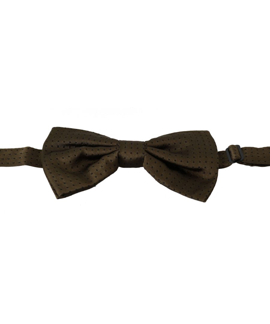 DOLCE & GABBANA Bow Tie\nAbsolutely stunning, 100% Authentic, brand new with tags exclusive bow tie.\nThis item comes from the exclusive collection.\nColor: Brown Polka Dots\nModel: Tied\nMaterial: 100% Silk\nAdjustable length neck strap, one size\nMade In Italy