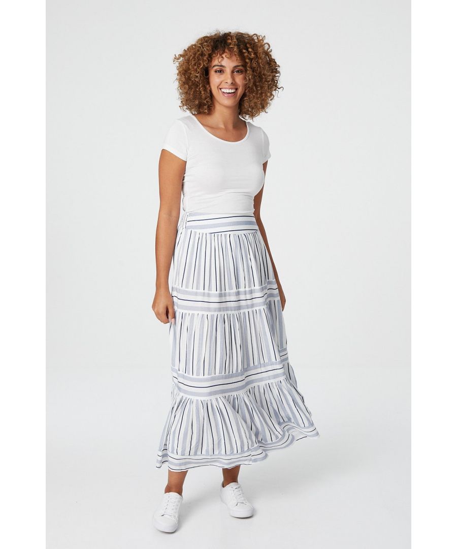 Add a bold striped skirt to your collection with this vertical and horizontal mixed maxi. With a high waist, a tiered full a-line skirt and a maxi length. Pair with a tucked in cami top and nude heels for a polished daytime look