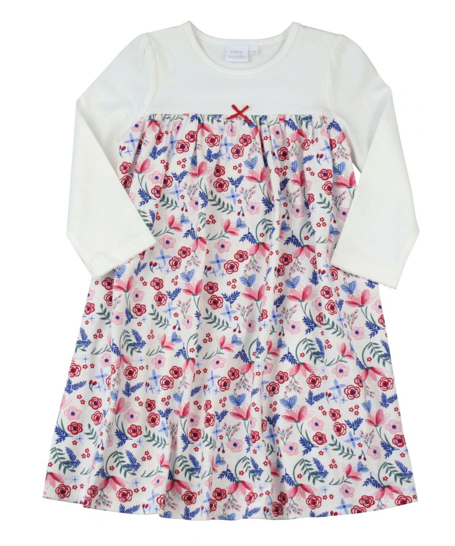 Girls Long Sleeve Cotton Night Dress\nThis printed nightie is both soft and cosy with plenty of room for movement. A winter floral printed skirt with plain bodice and sleeves with a pretty bow at the neck. A very classic design. \n\nTraditional, classic styling for our Girls lounge dress that can be worn daytime into evening.  \n\n100% cotton\nSoft Jersey fabric\nMachine Wash.\nPerfect Gift.