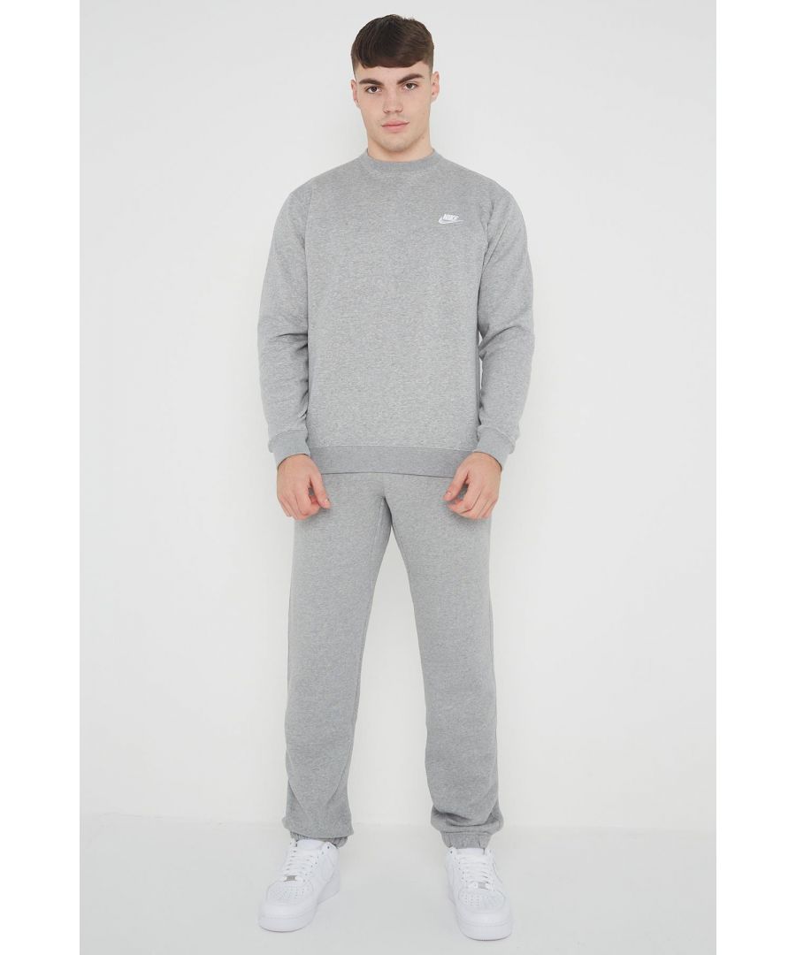 Nike Mens Crewneck Clubfleece tracksuit set.           \nCrafted from a Brushed Back Fleece.           \nRibbed Crewneck, Cuffs and Waist.          \nClassic Nike Logo Embroidered on the Left Chest.               \n80% Cotton, 20% Polyester.           \nMachine Washable.           \nAvailable in Black, Navy, Grey.