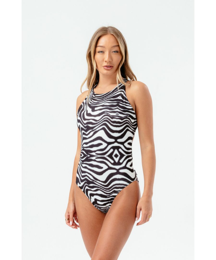 The HYPE. Women's Black Wave Scribble Swimsuit is your go-to look for poolside posing, beach days and summer trips to Mykonos. Designed in our standard women's one piece bodysuit shape in a swim material. Featuring a wave inspired pattern in a black and white colour palette and a woven side seem label boasting the HYPE. scribble logo. Wear as a swim piece or with a high-waisted skirt for a cute day look. Machine washable.