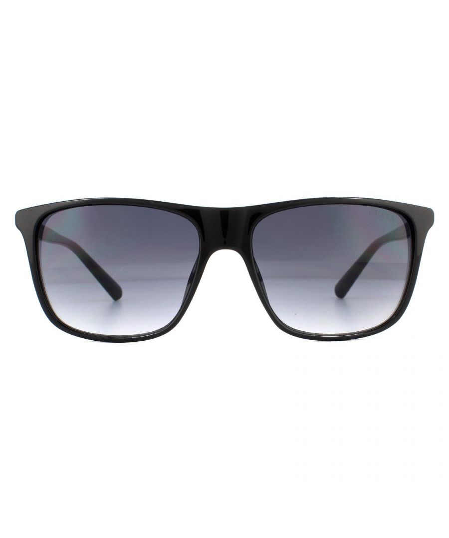 Guess Sunglasses GU6957 01B Shiny Black Grey Gradient are a masculine rectangular style crafted from lightweight acetate and feature a metal plaque Guess logo on the temples.