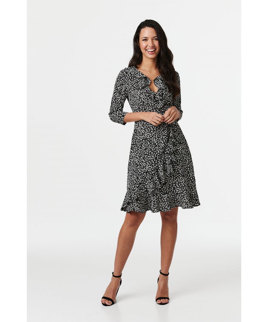 Every closet needs a figure flattering wrap front skater dress like this floral style. With a frilled v-neck, 3/4 sleeves, a faux wrap skirt and a knee length hem. Pair with black strappy heels for an effortless day to night look.