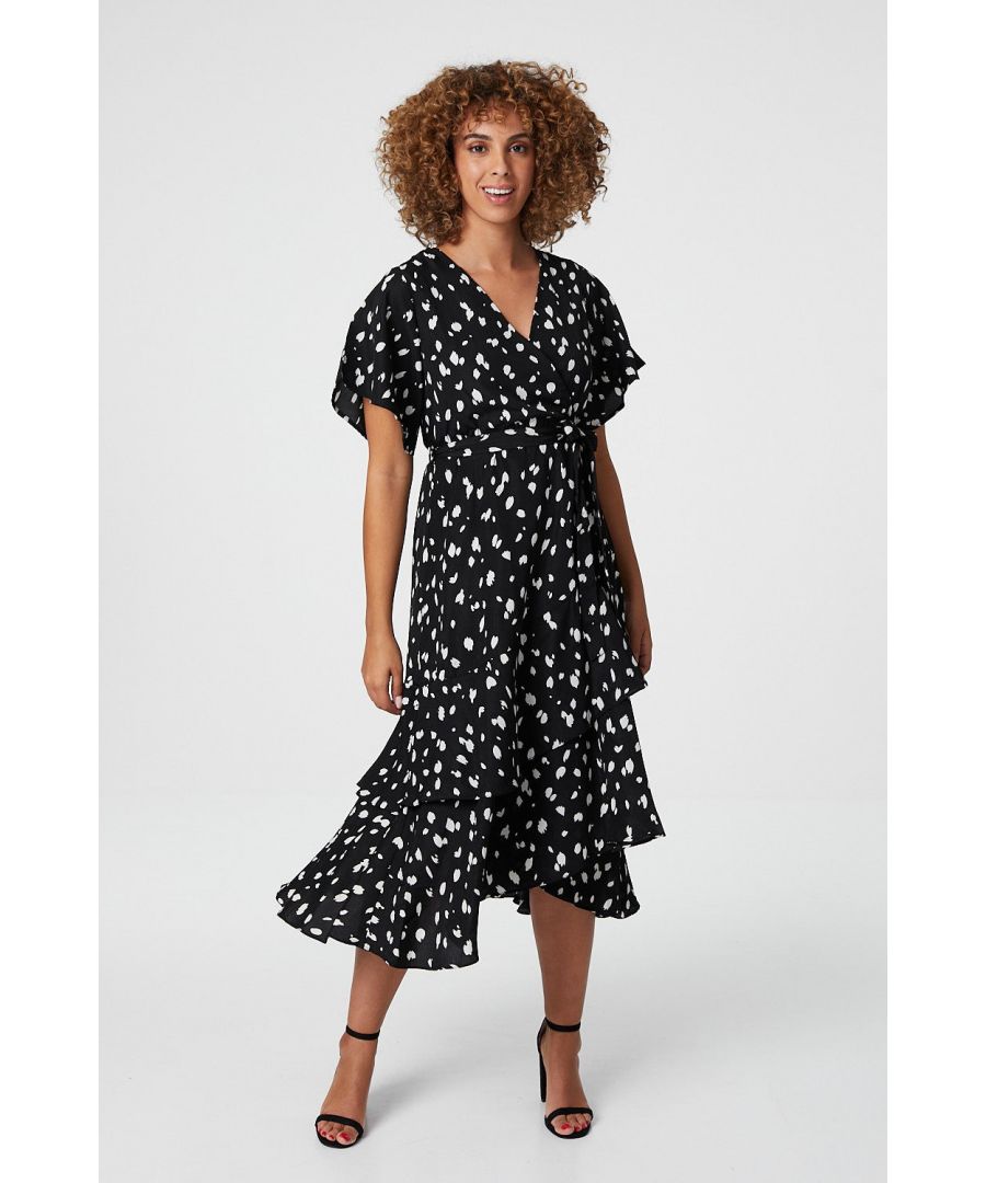 Dress to impress, in this gorgeous brushstroke polka dot print tea dress. It has a v-neck, wrap front, a tie waist and is in a midi length with a frilled hem. Wear with pointed courts and a clutch.