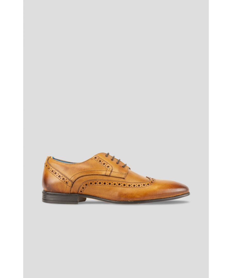 A classic Derby style shoe met with premium tan leather upper and lambskin lining introduces The Miles. A regular pointed toe complimented with an intricate, perforated brogue detailing makes this the ideal shoe to complete smart and sophisticated formal attire.\nOur insoles consist of extra padding, enhancing comfort, and reducing stress on the feet. An additional cellular cushion is added along the collar to further enhance comfort. Our soles are made from a flexible all-weather resin material to ensure durability without sacrificing comfort.\nUpper: LeatherLining: LambskinSole: Other Materials\nAll Oswin Hyde shoes come in 100% recycled packaging with complimentary storage bags, shoehorn and polish to keep your kicks looking their best.