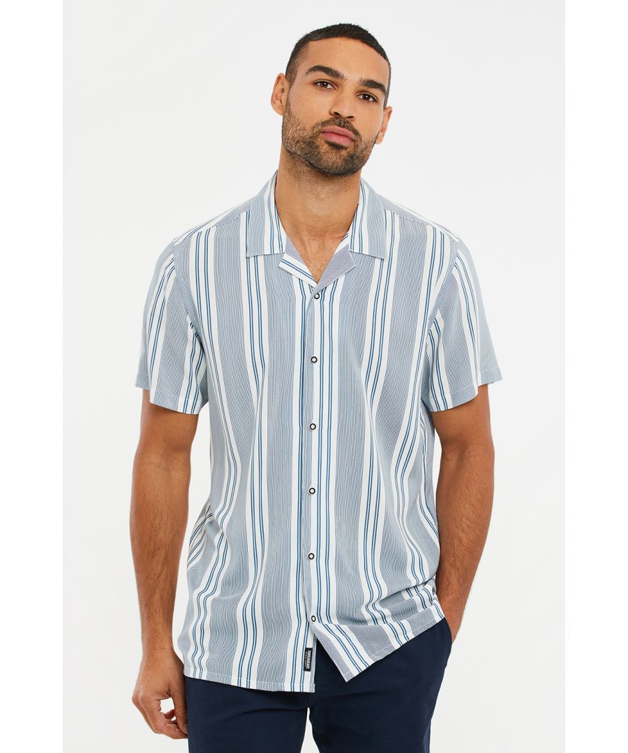 This striped shirt from Threadbare is designed with a revere collar and features an embroidered logo on the left chest. Style with jeans or chino shorts to complete the look.