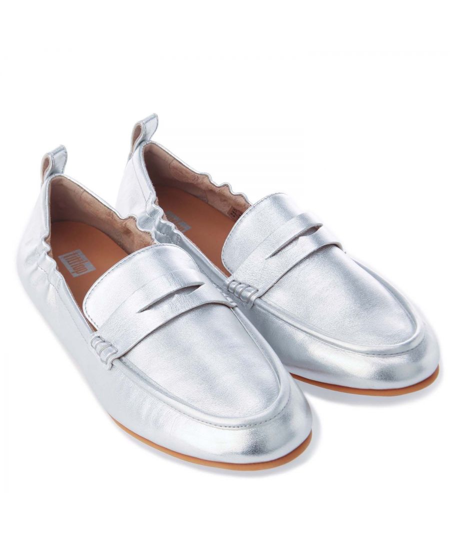 Womens Fit Flop Allegro Metallic Leather Penny Loafers in silver.- Premium nappa leather.- Slip on.- Penny loafer strap and moccasin piping.- Flexible  featherlight  with anatomically contoured footbeds.- Dynamicush™ cushioning.- Durable  slip-resistant rubber outsole.- Leather upper  Nylon lining  Synthetic sole.- Ref.: DY5011