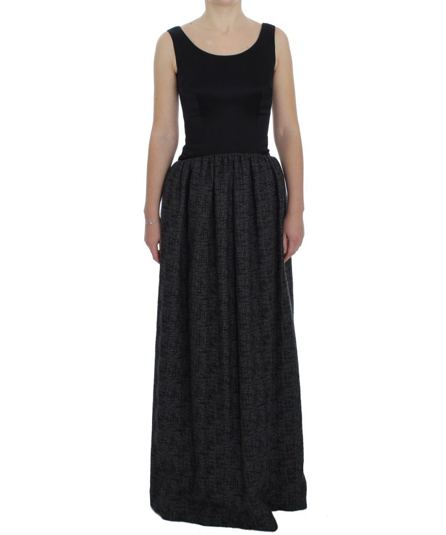 Dolce & ; Gabbana Gorgeous brand new with tags, 100% Authentic DOLCE & ; GABBANA black sheath full length dress Model : Full length sheath dress Color : Black and gray Back zipper closure Logo details Made in Italy Material : 55% Rayon, 28% Acetate, 12% Polyester, 5% Nylon