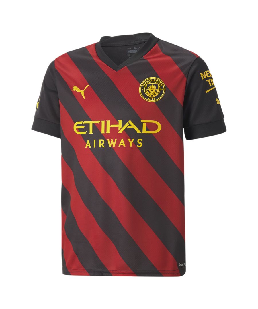 PRODUCT STORY :City put on a show. When the class of 1969 took to the road, they turned heads with their fearless, technically adept football – and their bold and brilliant new away strip. Conceived by the legendary Malcolm Allison, vertical stripes of red and black proved triumphant at the 1969 FA Cup Final, and the 1970 League Cup and European Cup Winners’ Cup finals, earning their place among all-time fan favorites. The 2022/23 Manchester City F.C. Away kit breathes new energy into a classic design. For the first time, red and black stripes flow down the jersey at an angle, inspired by the club crest and representation of the three Manchester rivers.   FEATURES & BENEFITS :dryCELL: Performance technology designed to wick moisture from the body and keep you free of sweat during exercise.Recycled Content: Made with 100% recycled material excluding trims & decorations as a step toward a better future. DETAILS :Regular fit.Set-in sleeve construction with raglan back seam.Flat knit v-neck.Embroidered PUMA Cat Logo on the chest and sleeves.Official team crest on the chest.