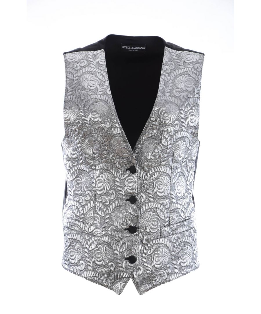DOLCE & ; GABBANA Gorgeous brand new with tags, 100% Authentic Dolce & ; Gabbana Top. Modèle : Gilet sans manches Matériau : 45% Polyester 43% Soie 5% Coton 4% Fibre métallique 3% Elasthanne Couleur : Brocart argenté métallique Dos en soie réglable Détails du logo Made in Italy