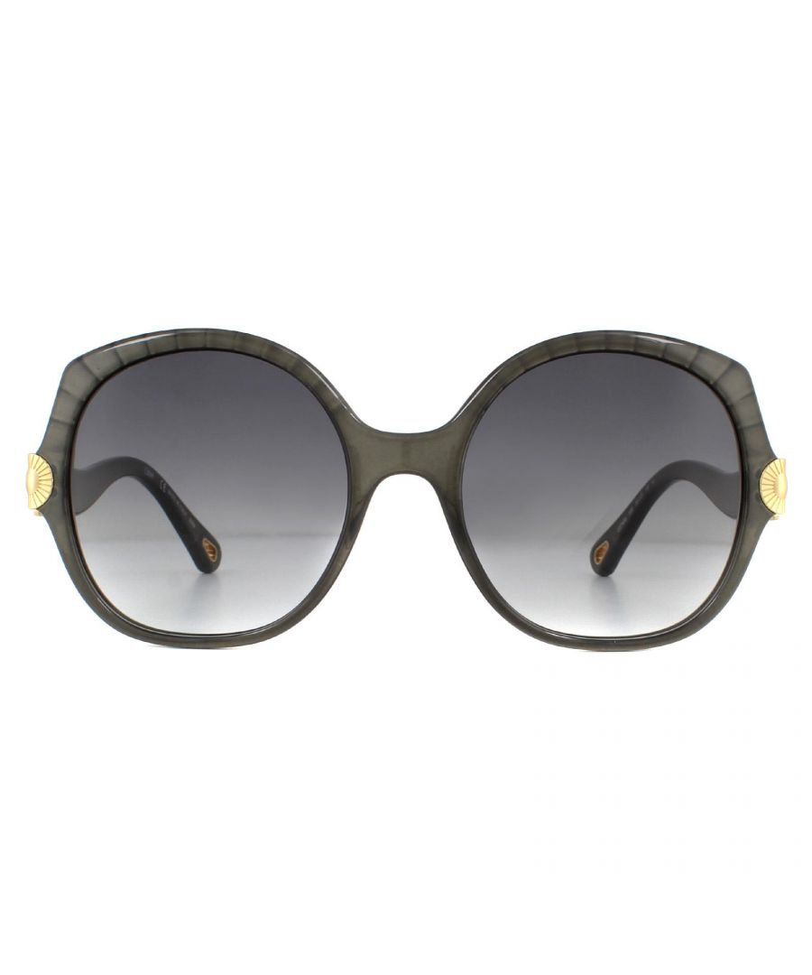Chloe Sunglasses CE749S 036 Dark Gray Gray Gradient are a gorgeous round shape with a plisse motif along the top of the frame and gold sun burst metal detailing inspired by the Chloe jewellery collection.