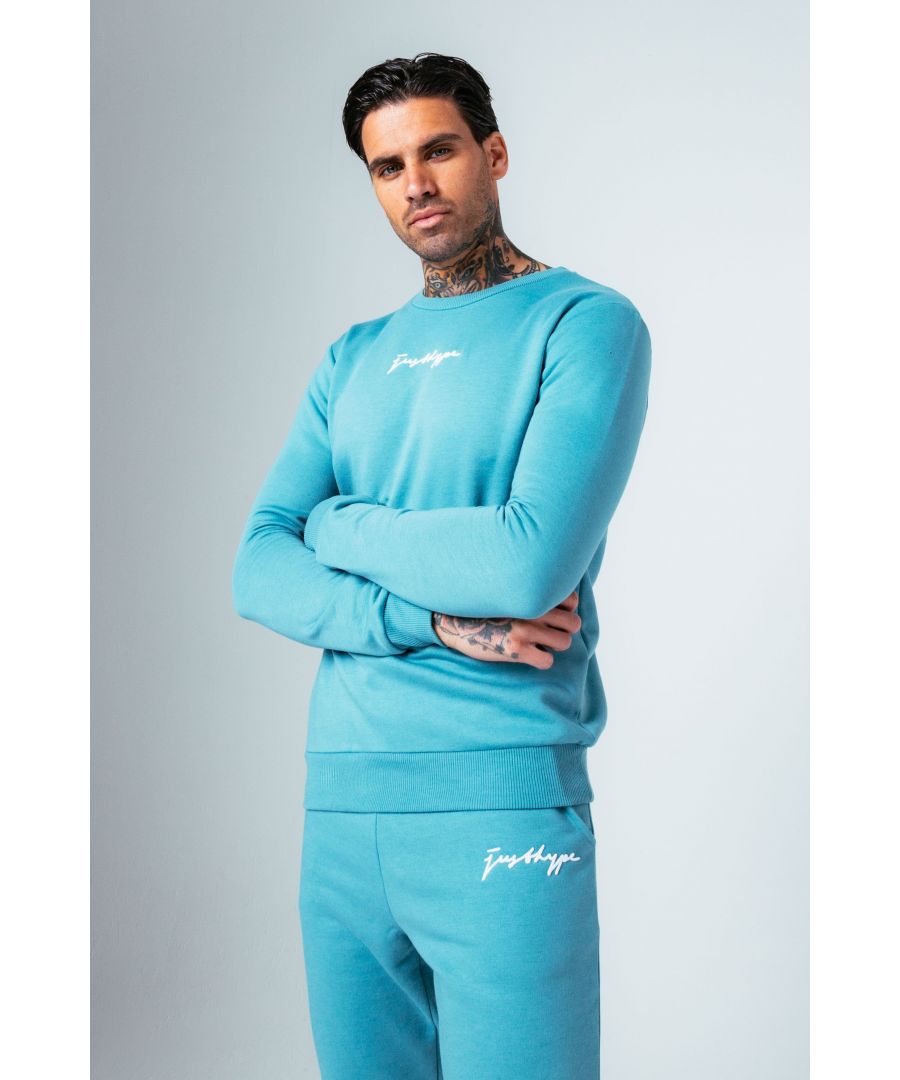 Introducing the HYPE. Sea Foam Signature Men's Crewneck Jumper. Designed in a teal colour palette in a 80% cotton and 20% polyester fabric base for supreme comfort and breathable space. With a crew neckline, long sleeves and fitted hem and cuffs in our standard men's jumper shape. Finished with the new! justhype signature logo embroidered across the front in a contrasting white. Wear with the matching joggers to complete the look. Machine washable.