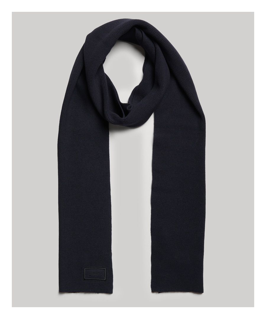 Bring an effortless air of confidence to any outfit this season with our Organic Cotton Logo scarf, an ideal choice for both wrapping up warm whilst also adding an instant style to your wardrobe. Finished with subtle Superdry branding, effortlessly casual and quietly on-trend outfits have never been easier to build.Ribbed designEmbroidered signature logoMade with organic cotton grown using natural rather than chemical pesticides and fertilisers. The healthier soil this creates uses significantly less water which is better for our planet and for the farmers who grow it.