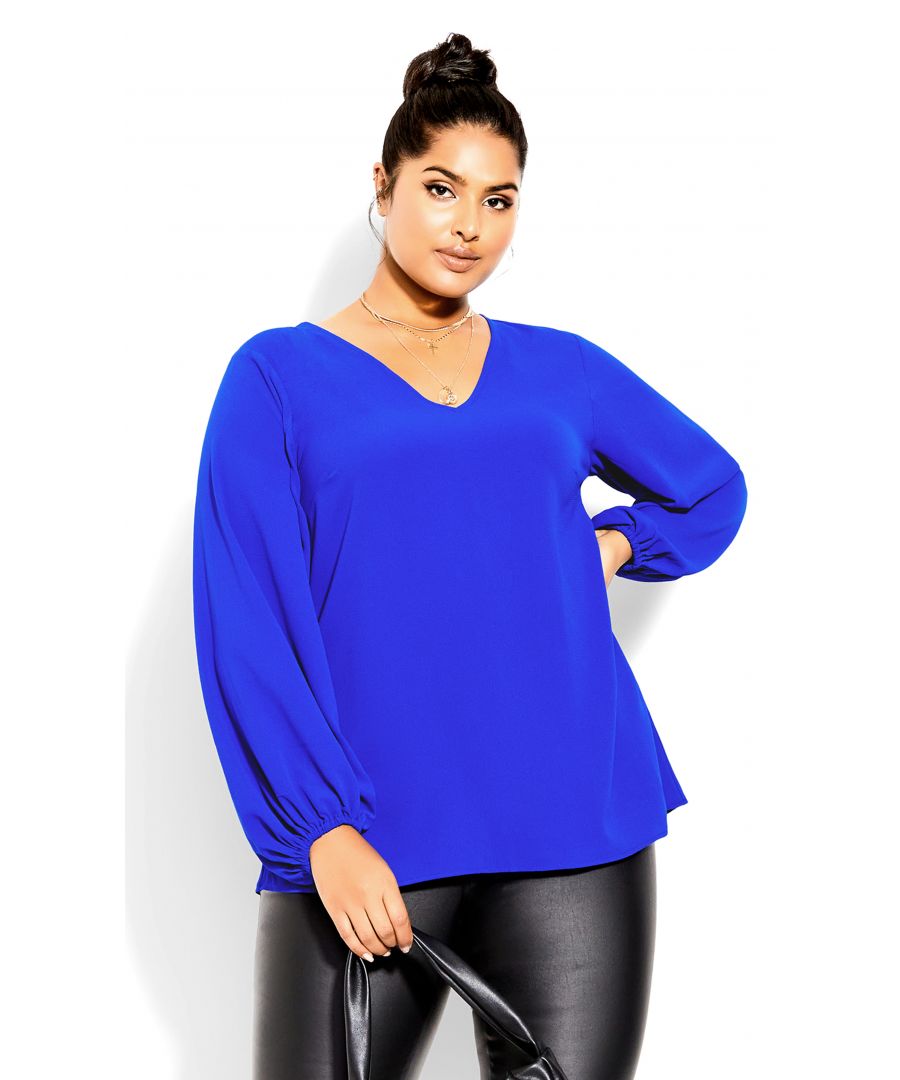 Instantly elevate your style with the Pippa Top! This gorgeous piece comes in a beautiful cobalt blue, and features long sleeves and a lightweight design. The perfect choice for your next night out or special event, this top is sure to turn heads. Crafted for your curves, this blouse boasts a V-neckline, lightweight unlined fabrication, and elasticated cuffs. The darted bust provides shape and the hip-length hemline flatters your figure. Key Features Include: - V-neckline - Unlined - Long sleeves with elasticated cuffs - Lightweight fabrication - Darted bust for shape - Hip length hemline