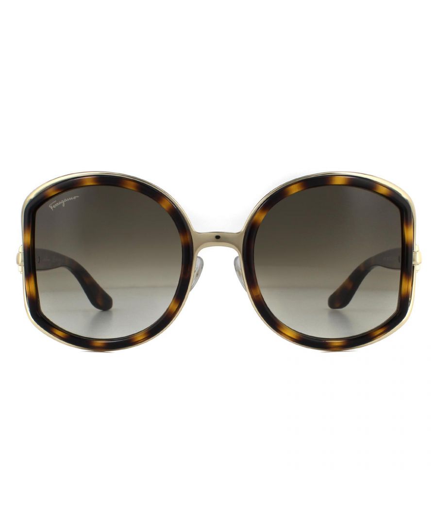 Salvatore Ferragamo Sunglasses SF719S 238 Dark Tortoise Brown Gradient are a glamorous oversized round style with cut out detailing around the outer edge of the lenses and Ferragamo branding engraved into the metal hinges.
