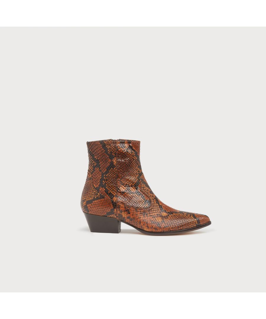 The cowboy boot makes for an unexpected style to be paired with the British heritage fabrics, and it's exactly this juxtaposition that we're having plenty of fun with. Crafted in Italy from honey-toned snake print leather, our Choral cowboy boots have a pointed toe, classic Western styling and a chunky low heel. Wear them with herringbone trousers and a seasonal knit for an eclectic autumnal look.