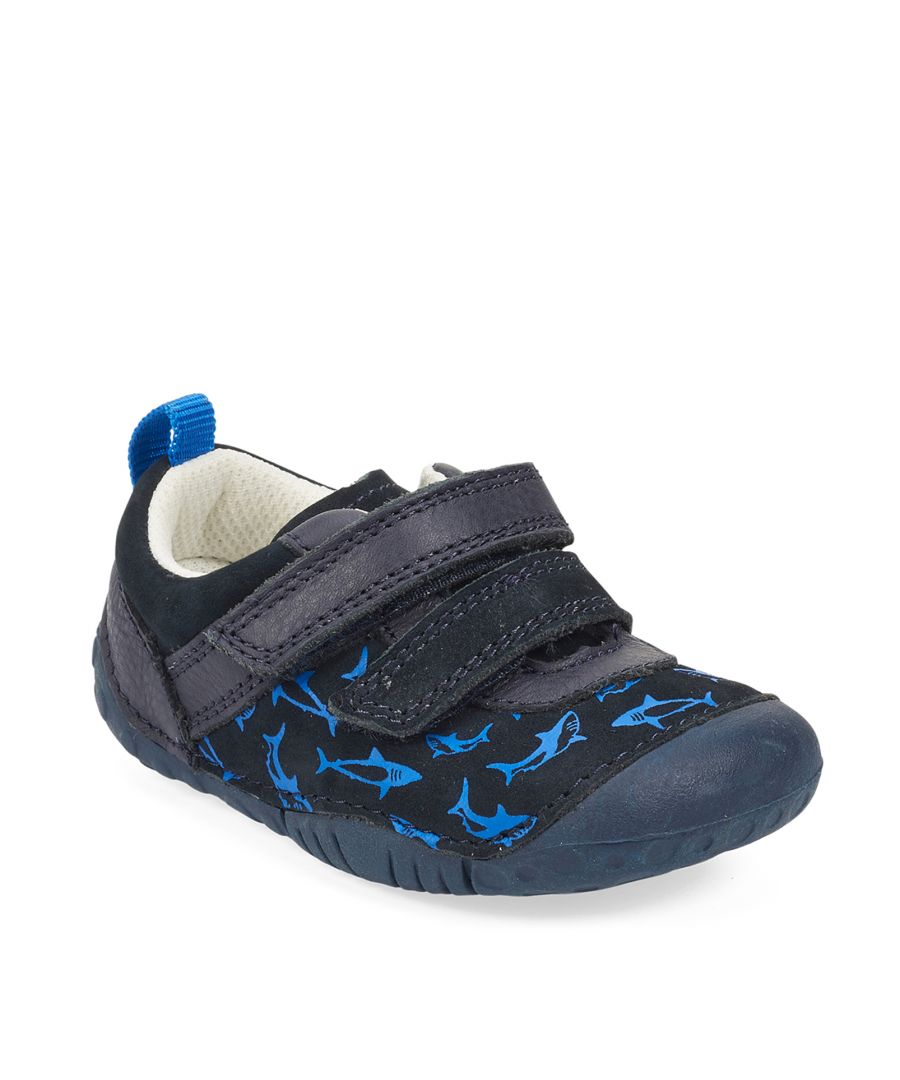A fin-tastic casual style pre-walker, specifically designed for tiny toes and chubby feet. Little Fin is crafted from a soft navy nubuck with an adorable shark print. Heel and toe bumpers protect little feet and ultra-flexible lightweight soles give unrestricted movement and barefoot comfort. There's a double rip-tape fastening for a snug fit and easy adjustment.
