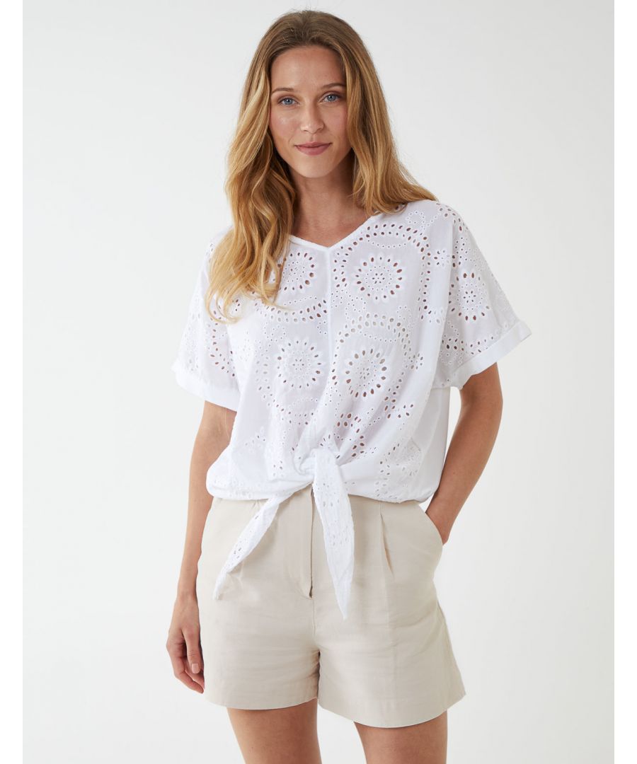 This lace tie front top is perfect for those warmer days! With it's relaxed fit and tie front, this outfit is perfect to add to any outfit. Pair with pair of sandals for a chic summer look. \n100% Cotton Made in ItalyMachine Washable V neckline Short SleeveUnfastened This item is One Size, fits UK 8-14Models height: 5€™9€ / 176 cm