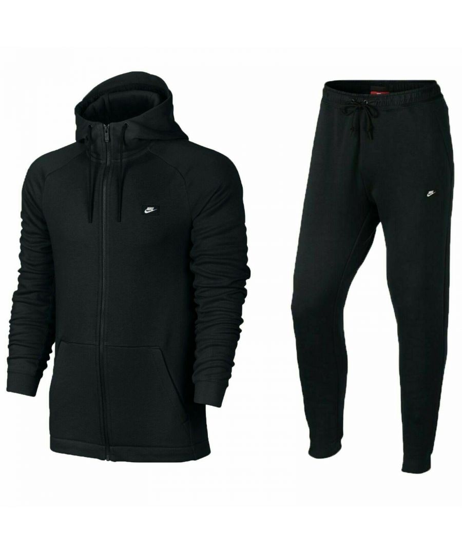 Mens Nike Sportswear Modern Fleece Tracksuit.\nMade With a Brushed Fleece for an Ultra-soft Feel.\nReglan Sleeve, Zip Up Hoodie, 2 Slanted Pockets.\nNike Sportswear Logo to Leg on the Joggers.\nTapered Fit for a Streamlined Look, Elastic Waistband With Drawcord.\nSide Zipper Pockets for Small Storage.\nElastic Ankle Cuffs and Added Nike Detail for Added Sports Style.\nSlip Pockets, Brushed Fleece Lining.