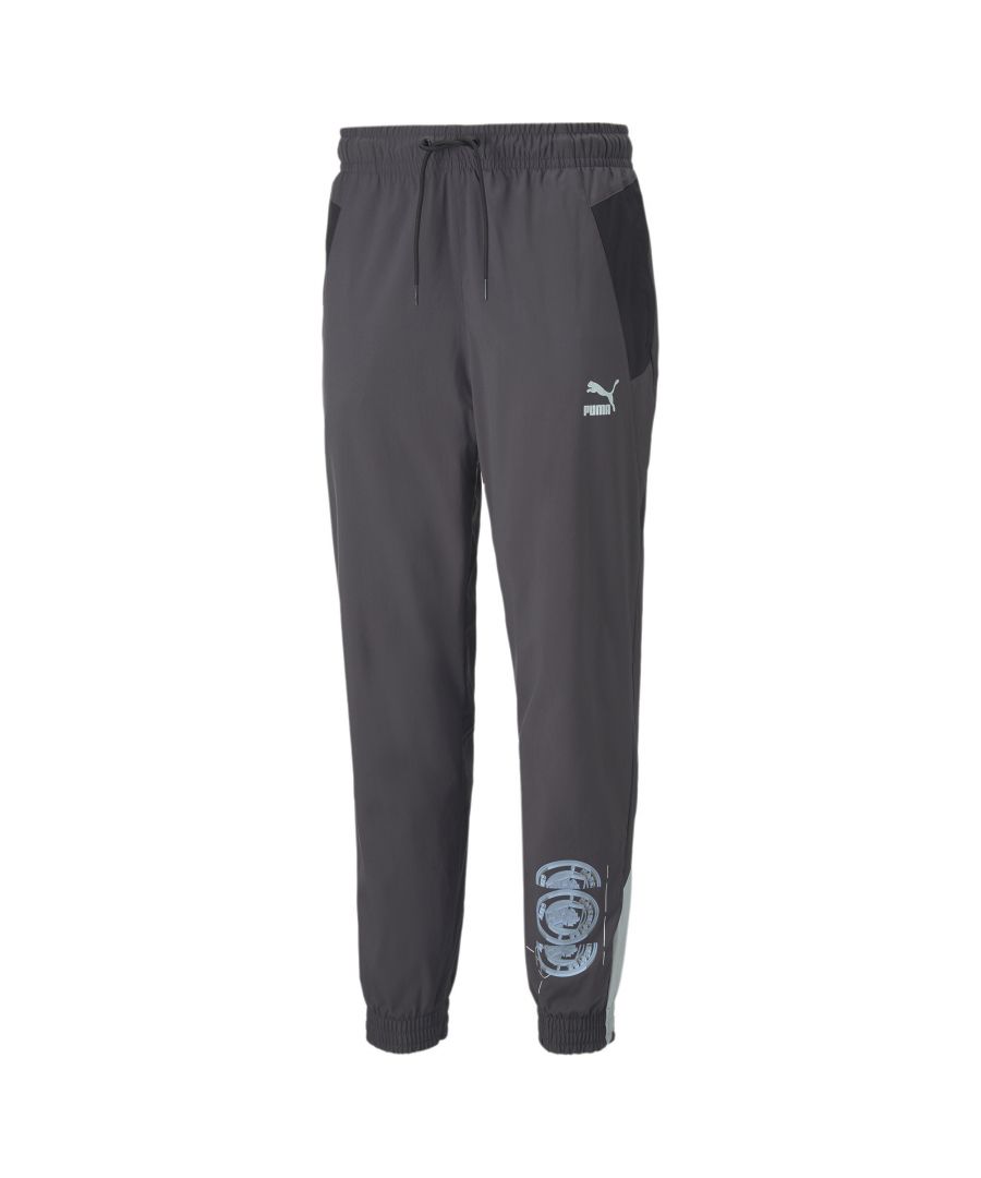 PRODUCT STORY Show your support for Manchester City F.C. in the Etihad, the city, or the metaverse – if that’s your thing – with the ftblStatement woven pants. The performance-focused construction makes them suitable for the training ground, too, and the glitchy team crest takes your support to a whole new digital dimension. FEATURES & BENEFITS : dryCELL: Performance technology designed to wick moisture from the body and keep you free of sweat during exercise Recycled Content: Made with at least 20% recycled material as a step oward a better future DETAILS : Regular fit Elasticated drawstring waist Side pockets Elasticated cuffs PUMA Archive No. 1 Logo and team crest on the leg