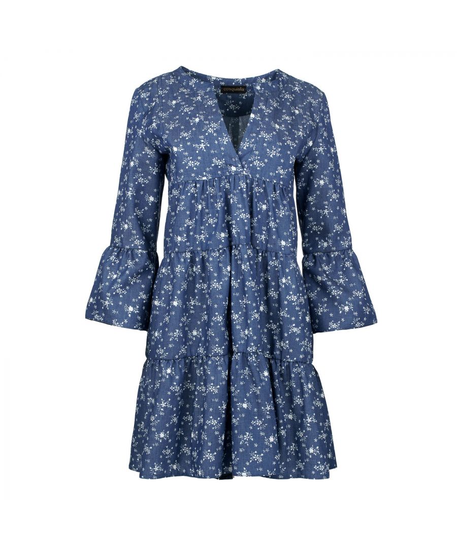 This indigo floral dress with gathered seams is crafted in denim style woven cotton. It has ¾ bell sleeves and a round neckline with a 24cm V opening in the front. There is a press stud on the inside at the bottom of the V to prevent it opening too much. There is oblong shaped double fabric below the V opening in the front. The dress has two 24cm wide ruched panels. There is a double pleat in the back. The dress is styled in a loose A line silhouette and hits above the knee.