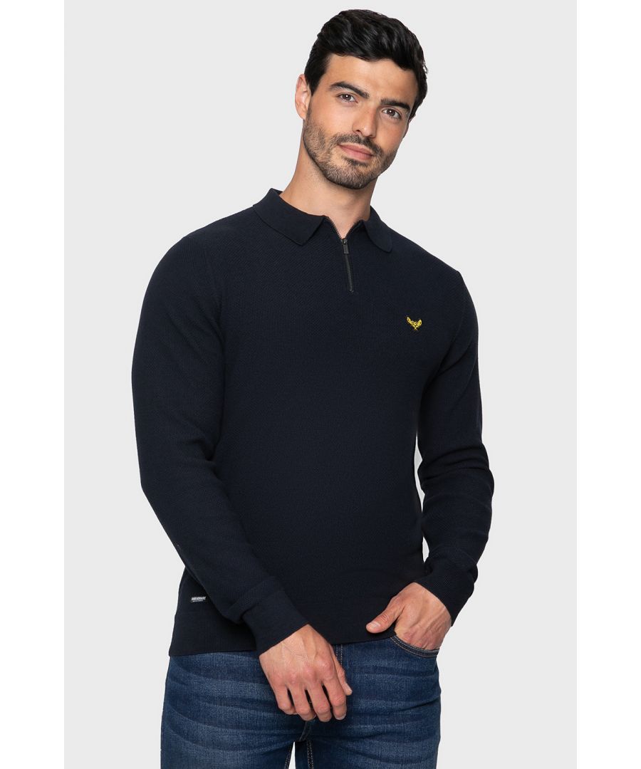 Elevate your wardrobe with this cotton rich, fine knit, textured jumper from Threadbare featuring a polo collar with zip fastening and ribbed hem and cuffs. Team with a pair of jeans or casual trousers to complete the smart casual look. Other colours available.