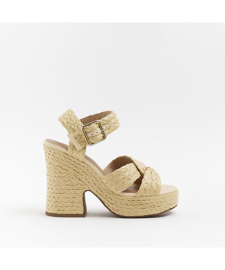 > Brand: River Island> Department: Women> Colour: Beige> Type: Heel> Style: Platform> Material Composition: Upper: PU, Sole: Plastic> Upper Material: PU> Occasion: Casual> Pattern: No Pattern> Season: SS22> Closure: Buckle> Toe Shape: Open Toe> Heel Style: Wedge> Heel Height: Very High (Over 10 cm)