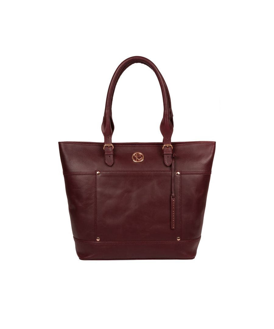 With a practical and smart design, the 'Monet' tote bag from Pure Luxuries London is crafted from leather with a luxuriously smooth finish, adorned with rose gold metal fittings. The spacious compartment comes with two pockets, lined with natural 100% cotton and is secured by a zip-over top. Additional storage space is provided by an eye-catching front slip pocket that is ideal for on-the-go storage. Comes with adjustable leather handles and is adorned with a Pure Luxuries London logo and charm.
