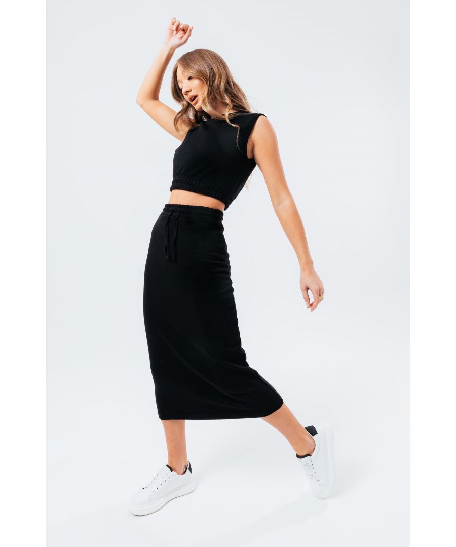 The HYPE. Black Sweat Crop tee and Midi Skirt Women's Loungewear Set if your new go-to everyday essential. Both garments boast a 80% Cotton and 20% Polyester fabric base for the ultimate comfort and breathable room. The top boasts our standard Women's vest tee with a sleeveless base and fitted waistband detailing. The midi skirt highlights an elasticated waistband, drawstring pullers in a midi length. Wear together to complete the set or stand alone paired with seasonal favourites. Machine washable.
