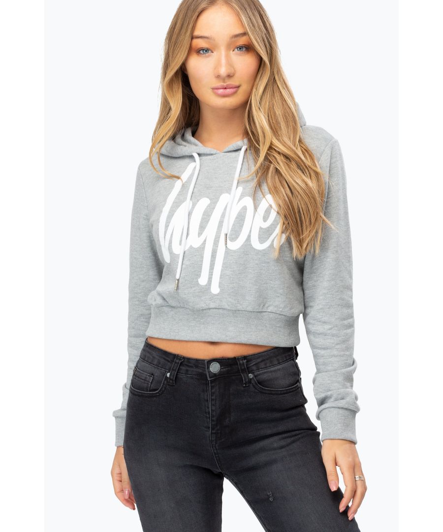 The hoodie staple you need every season. The HYPE. Women's Crop Pullover Hoodie. With a fixed hood, fitted cuffs, elasticaited waistband and kangaroo pocket. Designed in a soft touch fabric base for the ultimate comfort and breathable space. If you like an oversized fit, opt for a size up, if you like a casual fit, stay true to your usual size. The model wears a size 8. Machine Washable