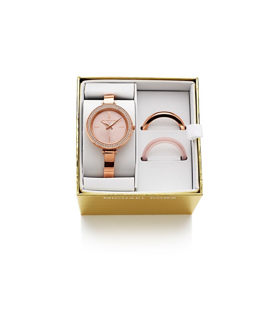A gift set with a difference from Michael Kors as the bezel can be unscrewed so giving three different options. The 39 x 9.5mm rose gold plated case houses a simple dial with rose tone quarter markers and hands. Finished with an 8mm bangle and bracelet with an adjustable link fastening to ensure a comfortable fit on the wrist. All in all, a great gift option. Water resistant 50m.